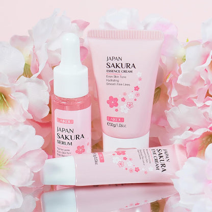 Skincare products with Sakura branding on a pink floral background